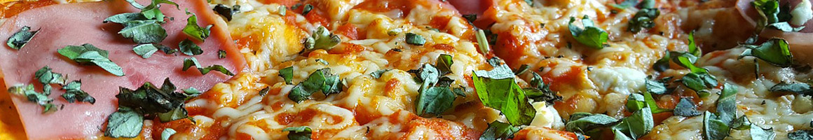 Eating Pizza at Luigi's Pizzeria restaurant in Hermitage, PA.